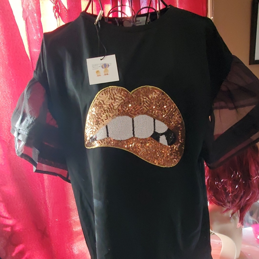 In2 you pullover blouse with " biting my lip"